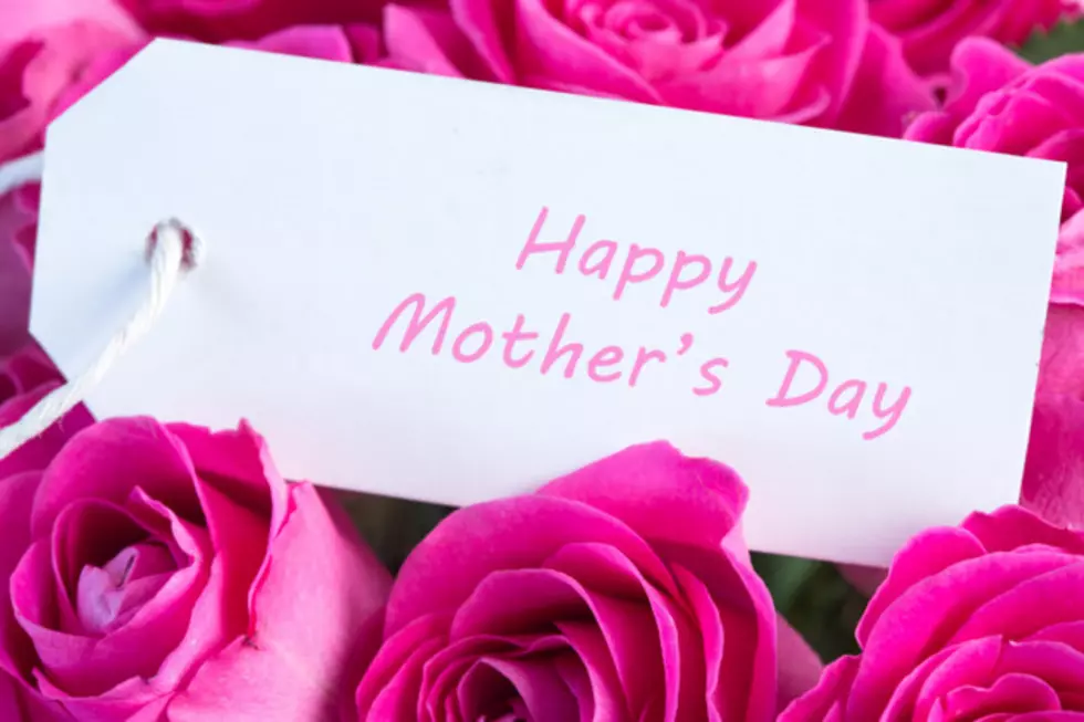 Close-up of a bouquet of pink roses with happy mothers day card in pink