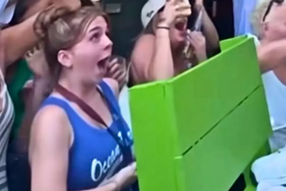 Girl looks shocked when Jason Kelce rips his shorts off to reveal a patriotic Speedo at the OD in Sea Isle